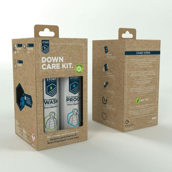 Packaging for Storm Down Care Kit, containing Down Wash and Down Proofer in cylindrical bottles, with drying balls and a dosage cup, presented in cardboard packaging with product information.